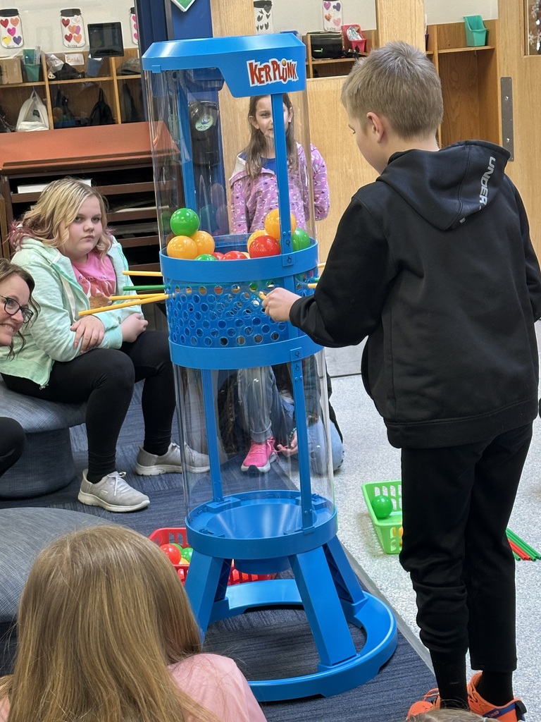 students playing kerplunk