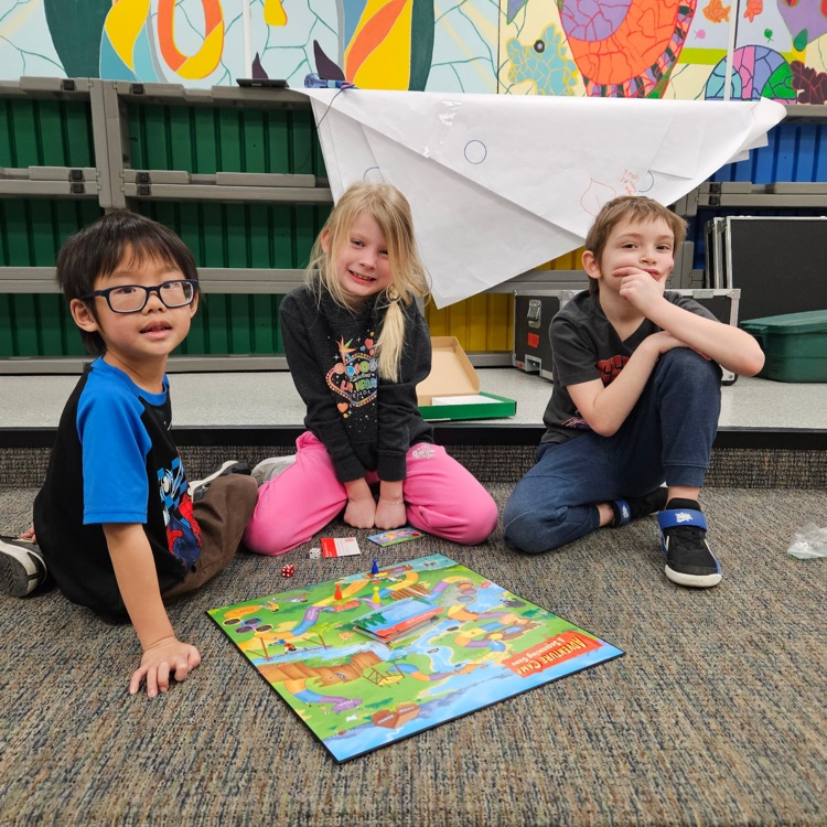 students playing board games 