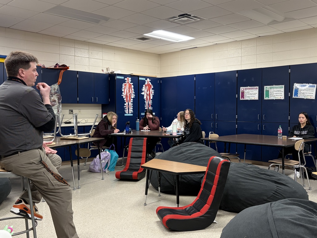 Mr. Korger speaking to students