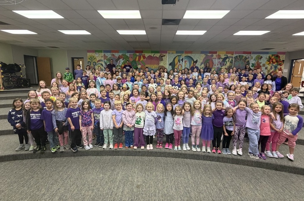 Elementary Students wearing purple