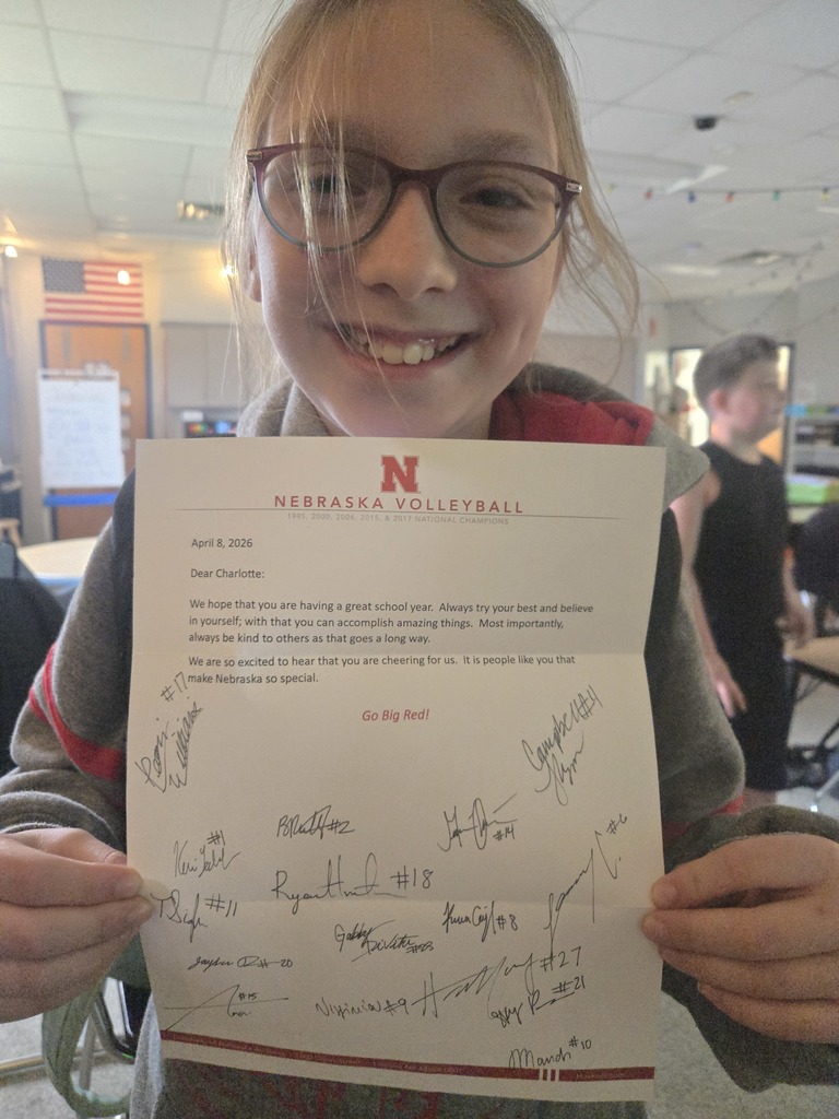 Charlotte holding her letter