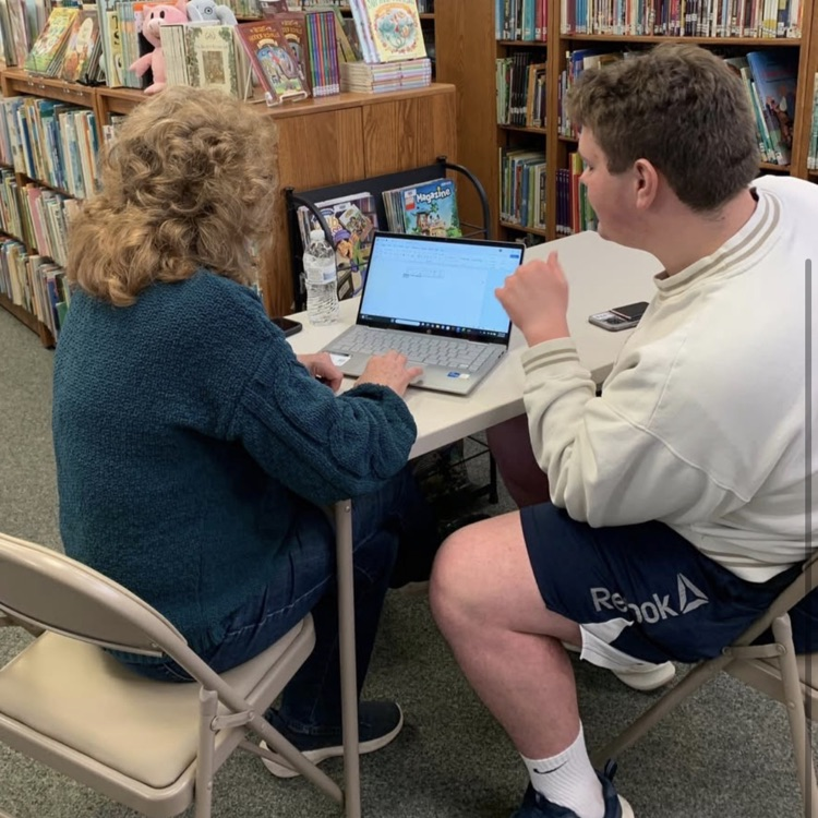 student helping