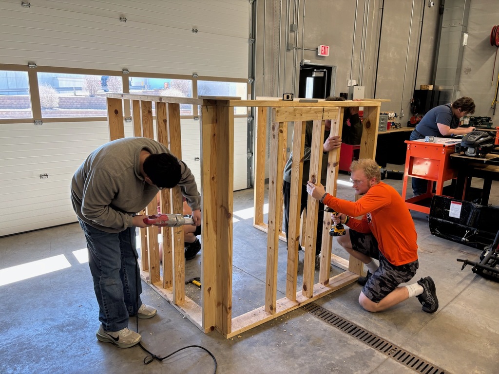students working in tech center