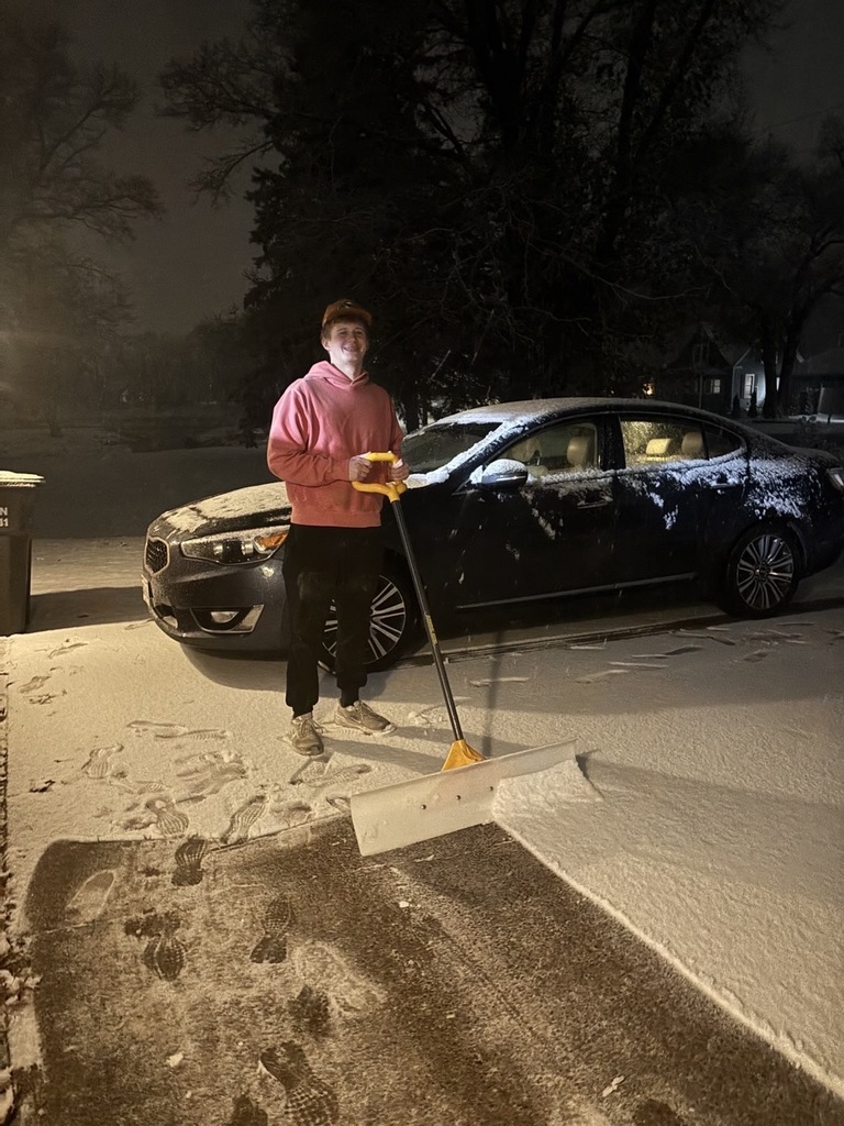 Drew shoveling snow
