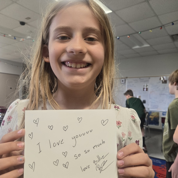 Aurora holding letter