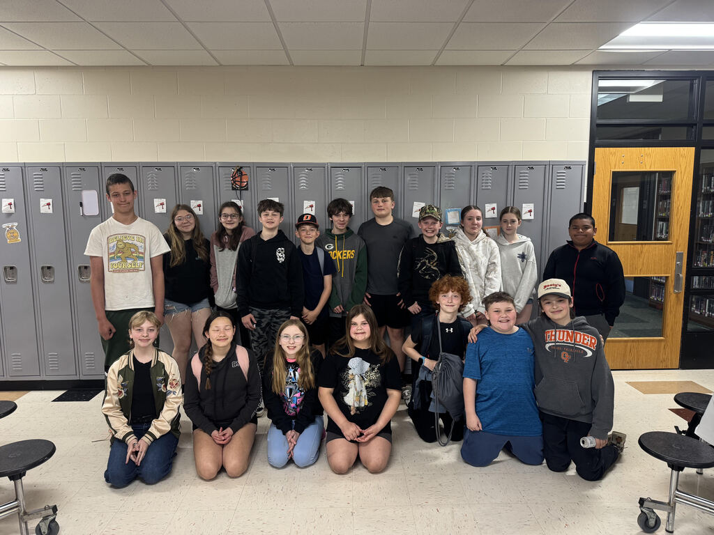 Middle School Students in front of lockers