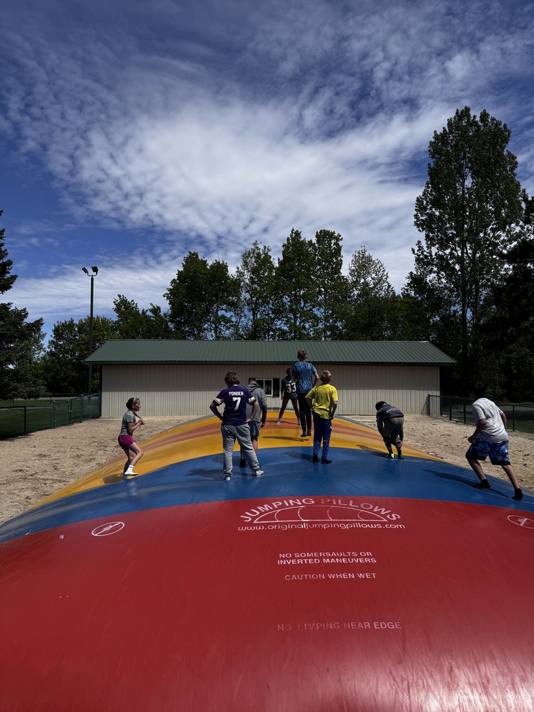 students on jumping pillow