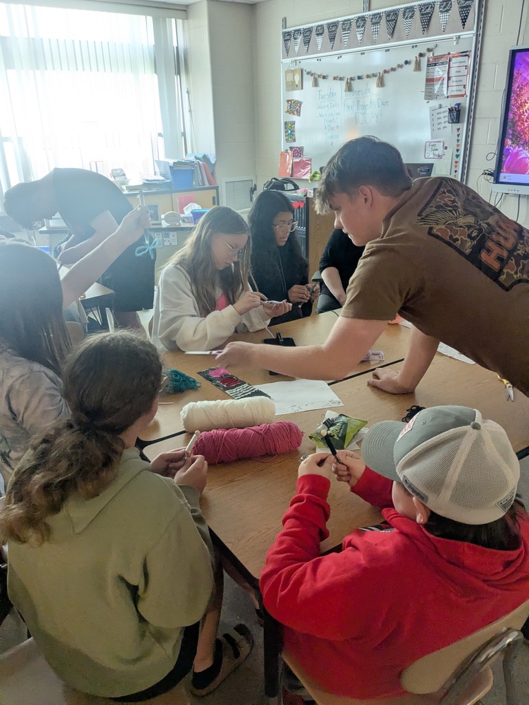 students making worry dolls
