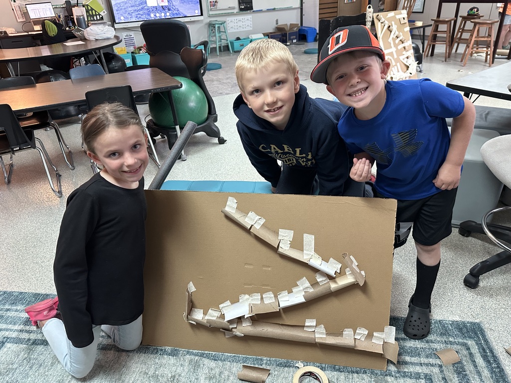 Students with marble maze