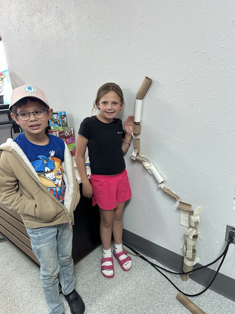 Students with marble maze