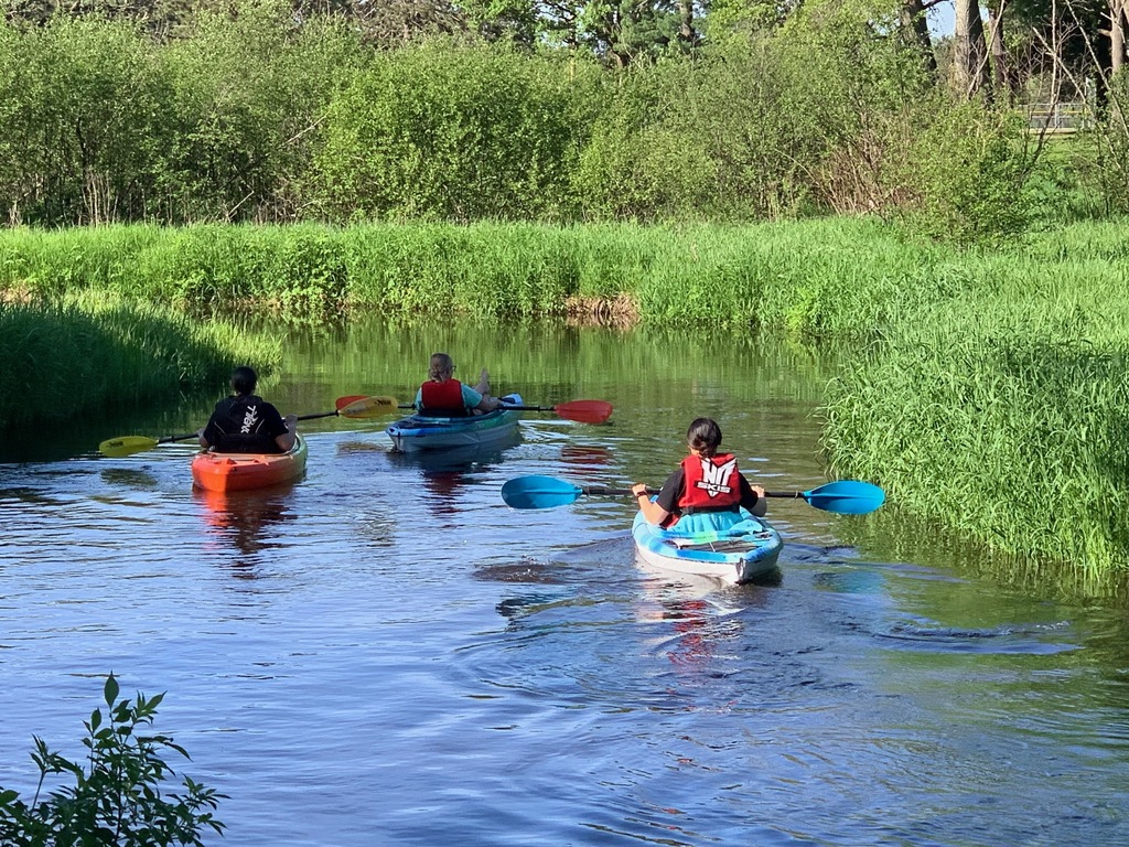 student in kayak