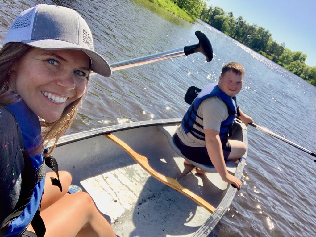 student in kayak