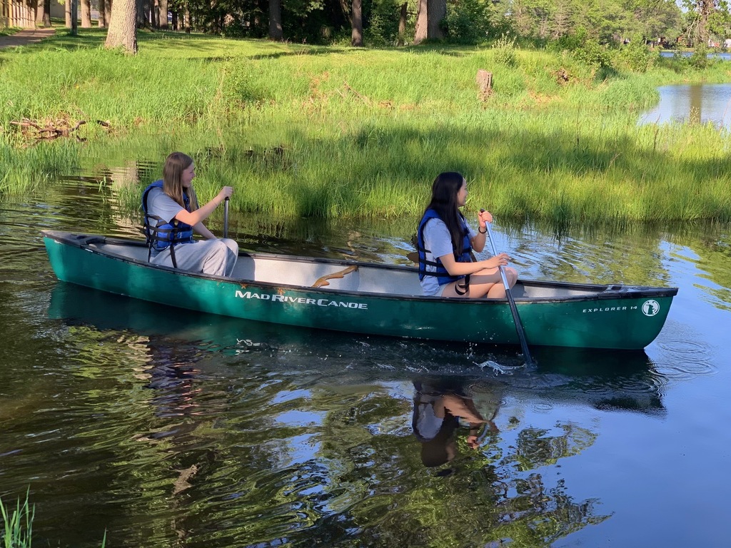 student in kayak