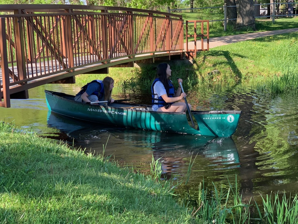 student in kayak