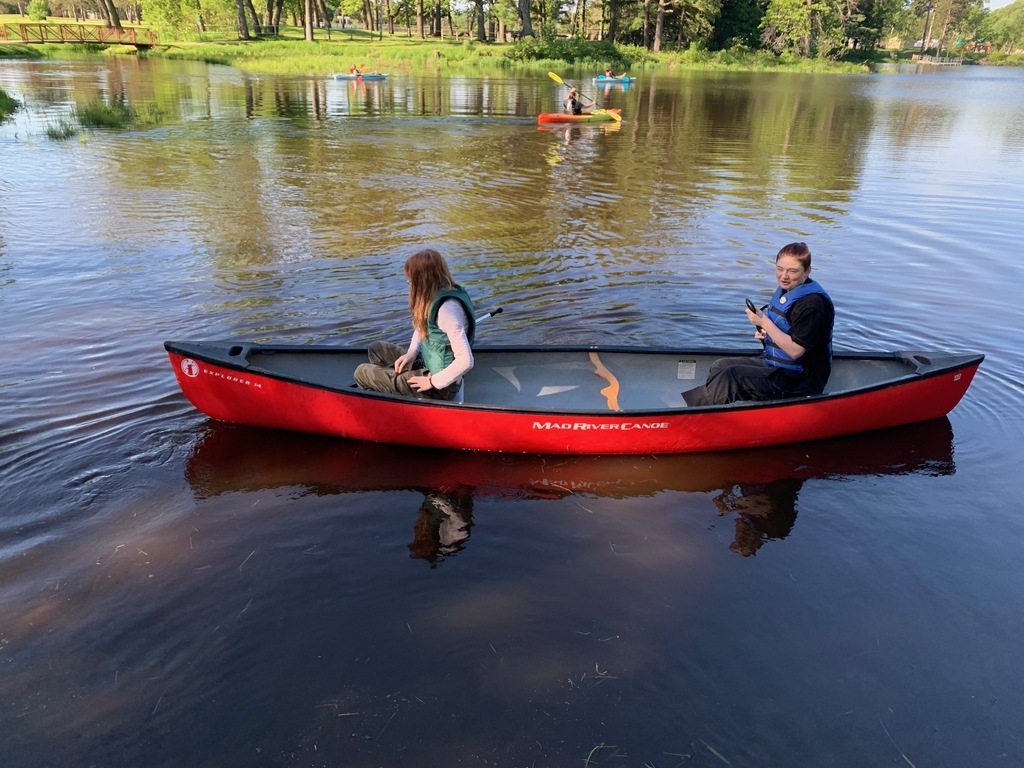 student in kayak