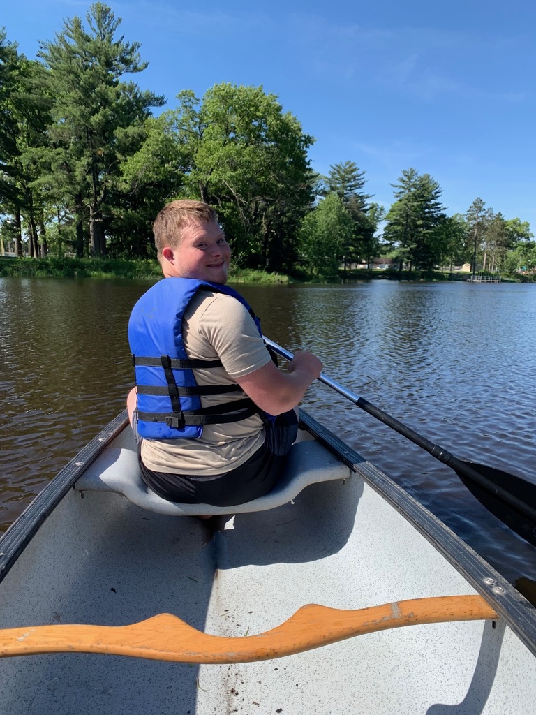 student in kayak