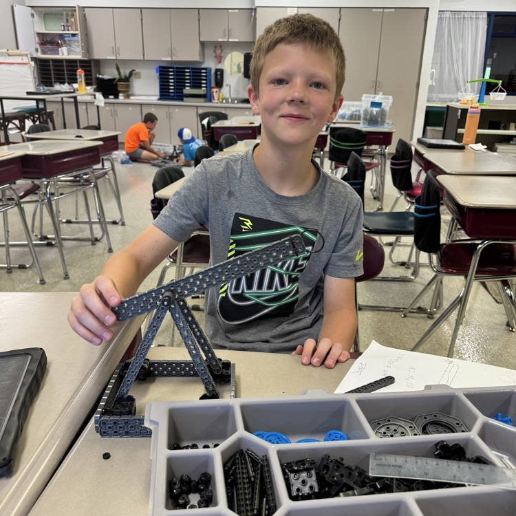 student with vex kits