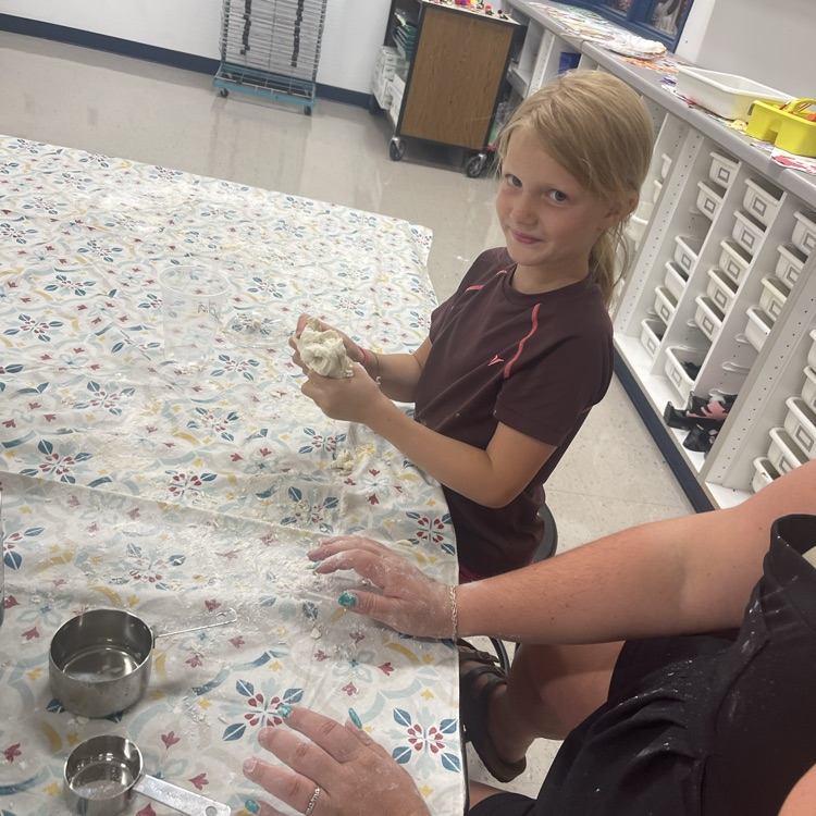 students playing playdough