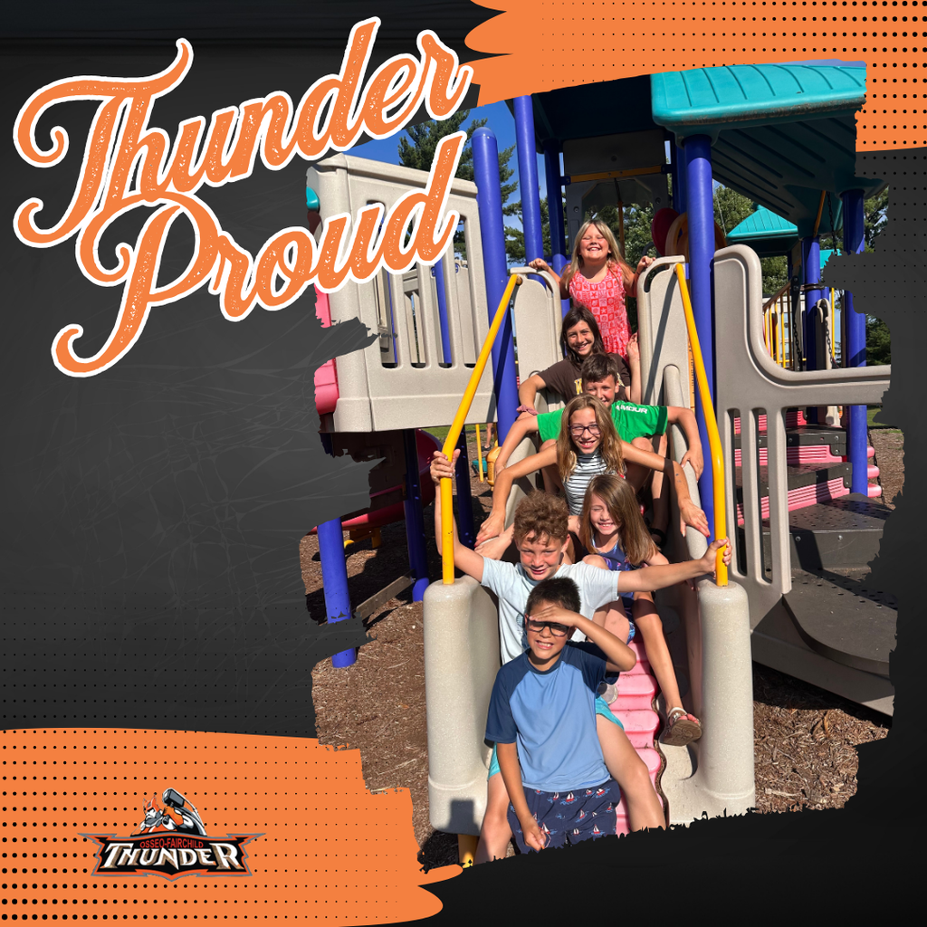 Seven Student on playground equipment