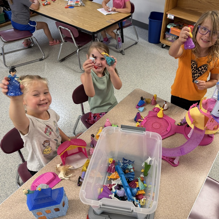 students playing at a table