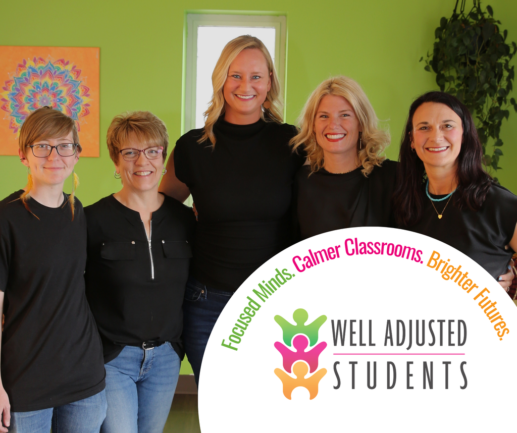 Photo of 5 people in black shirts (Well Adjusted Students)