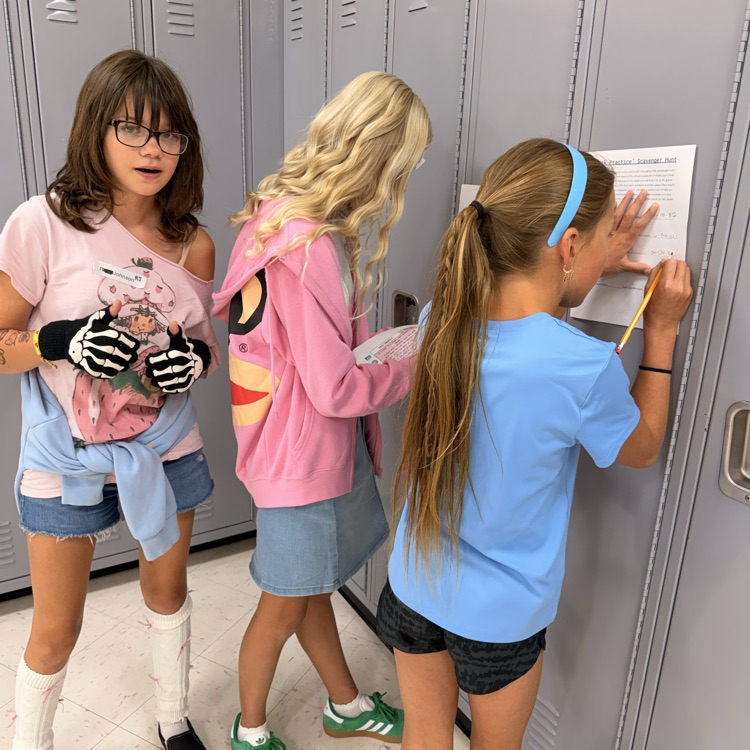 students by lockers 