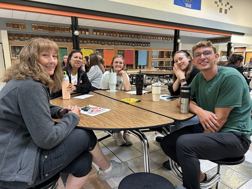 Teaching staff working at table