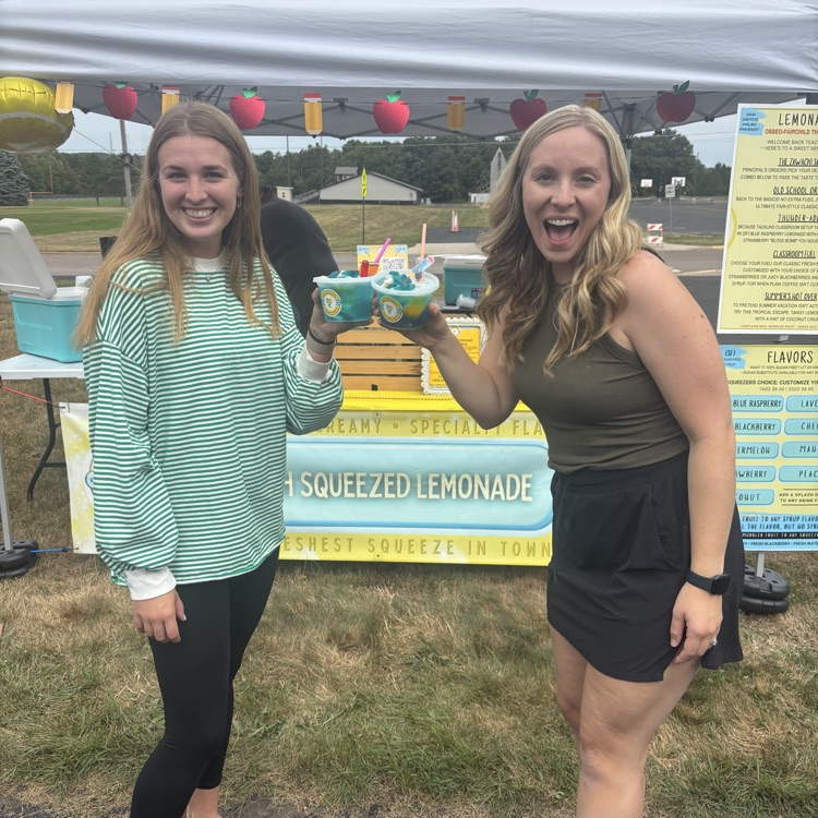 cheers!  two women holding lemonade