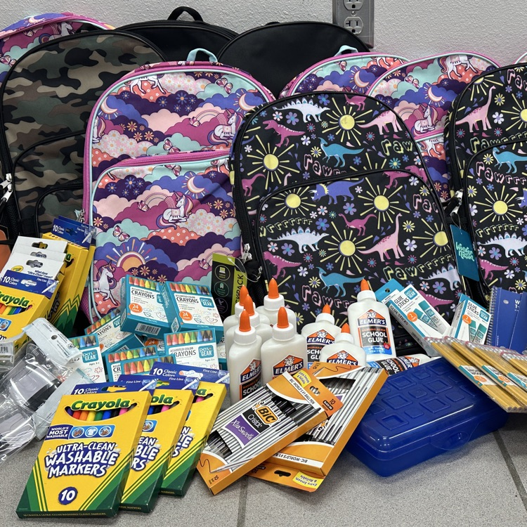 school supplies. backpacks markers glue pens 