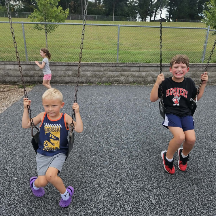 boys on swings