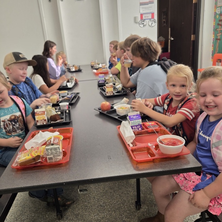 students at lunch table 