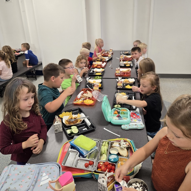 students at lunch table 