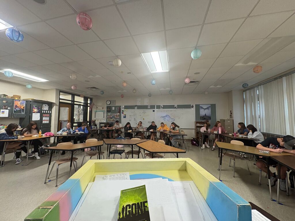 Students reading in a classroom