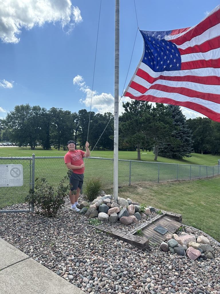 Max raising the flag
