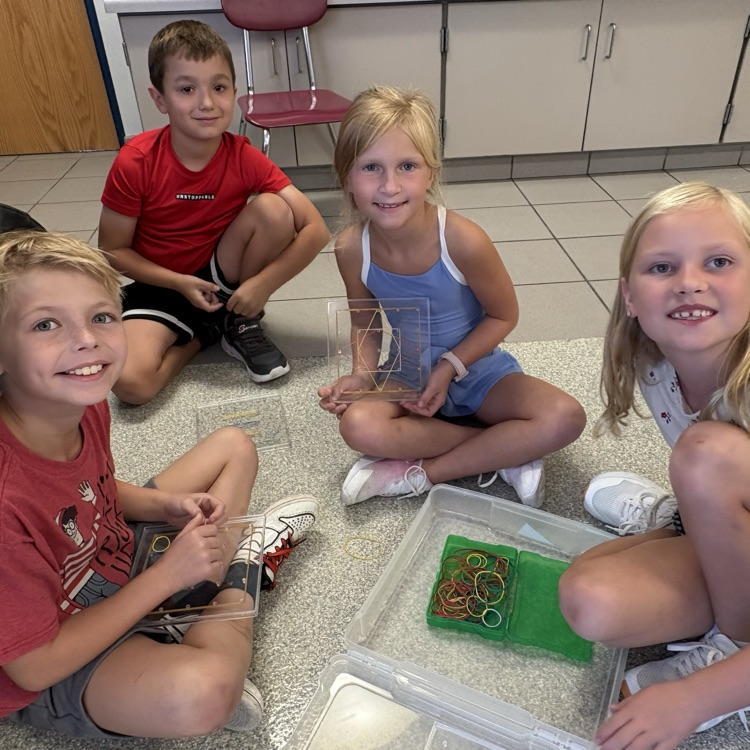 students with pattern blocks