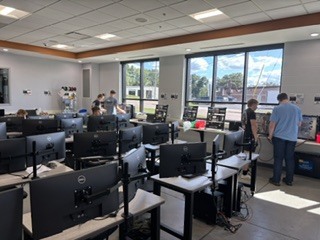 students working in tech building