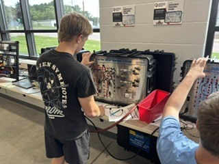 students working in tech building