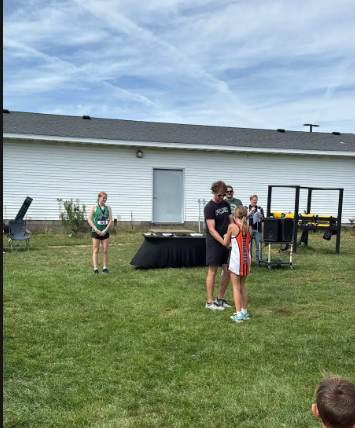 Reece receiving medal for race
