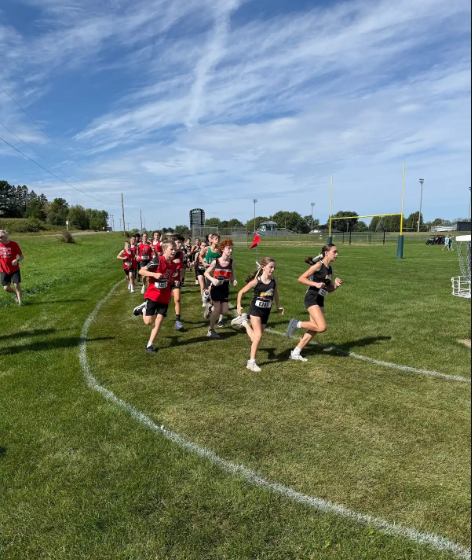 Cross Country runners running race