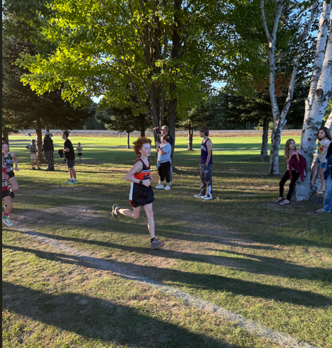 cross country runners on trail