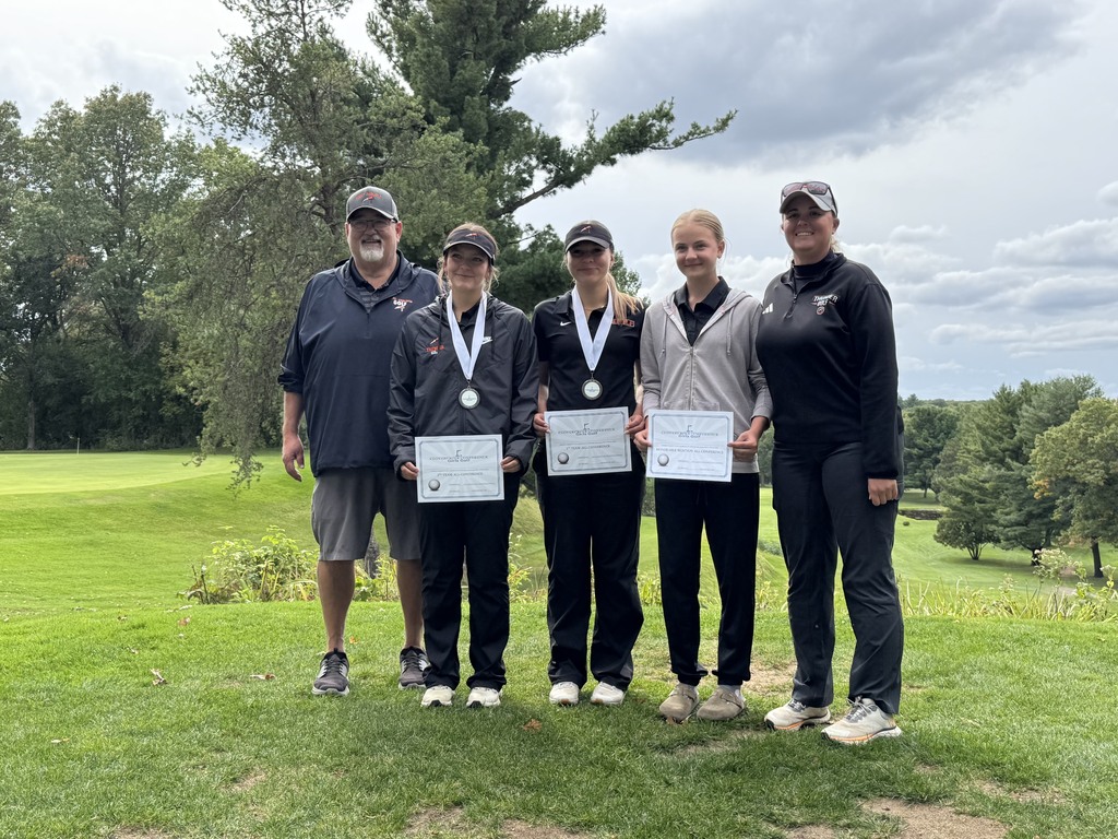 Golf team All Conference winners with coaches