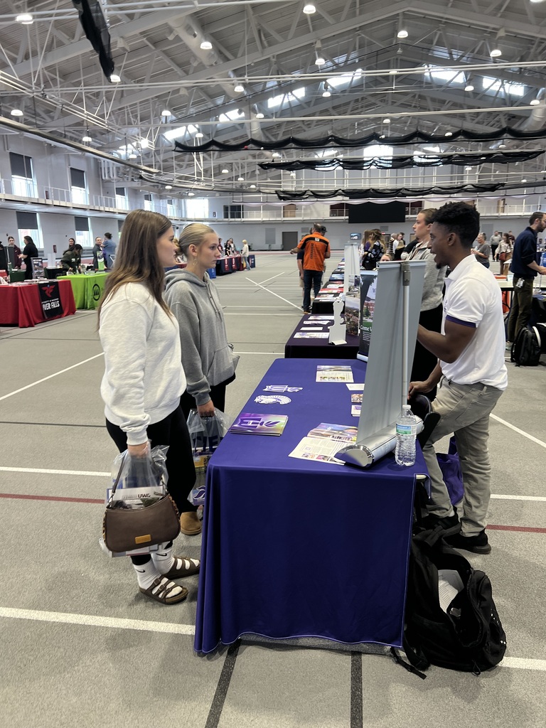 Students visiting booths at Education fair