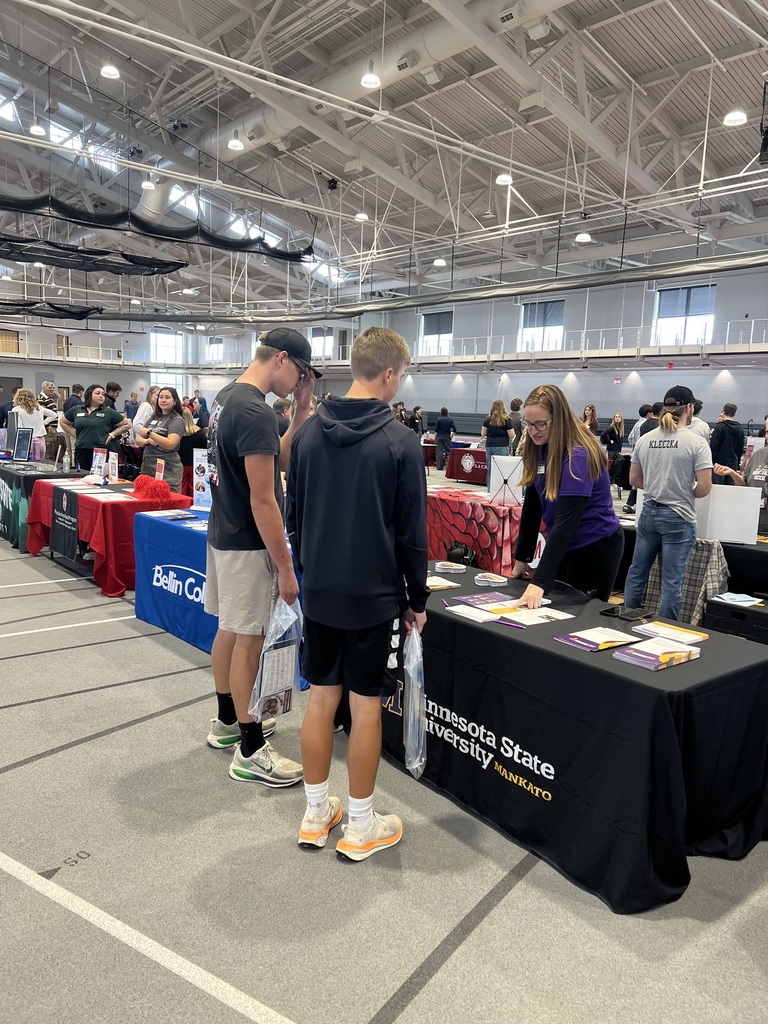 Students visiting booths at Education fair