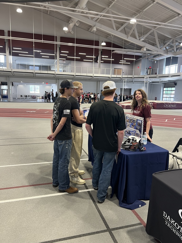 Students visiting booths at Education fair