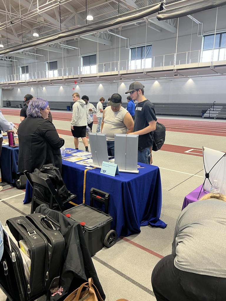 Students visiting booths at Education fair
