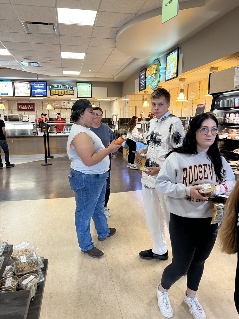 Students standing in cafeteria