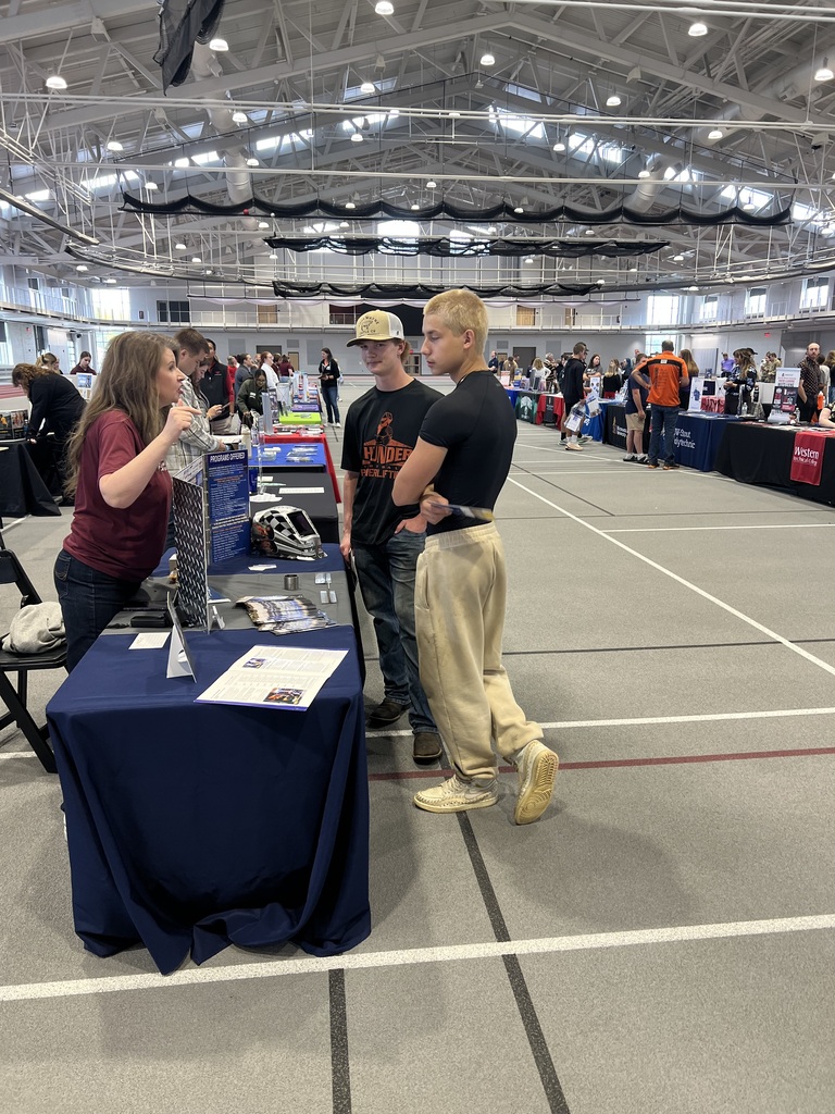 Students visiting booths at Education fair