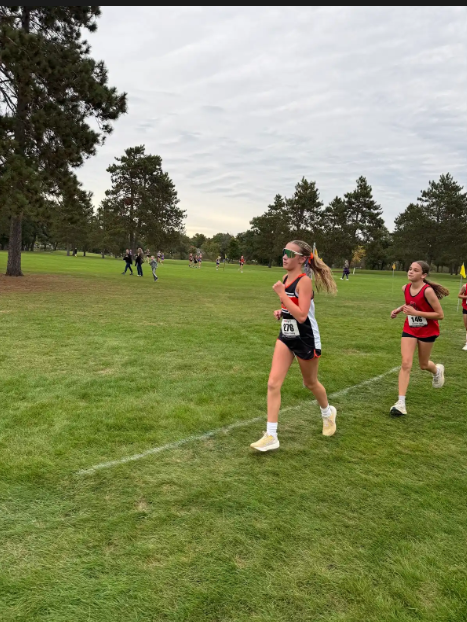 Cross Country runners running race