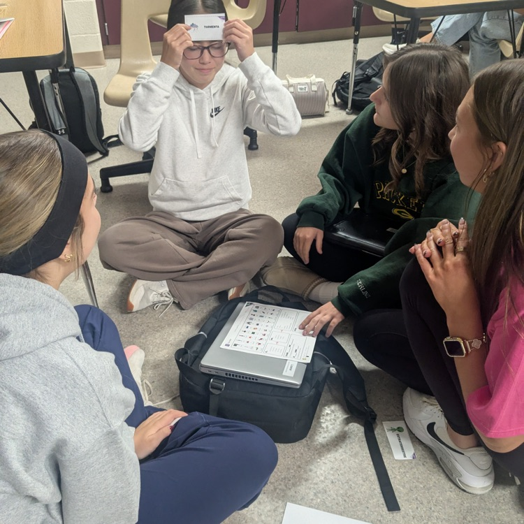 high school students playing headbands