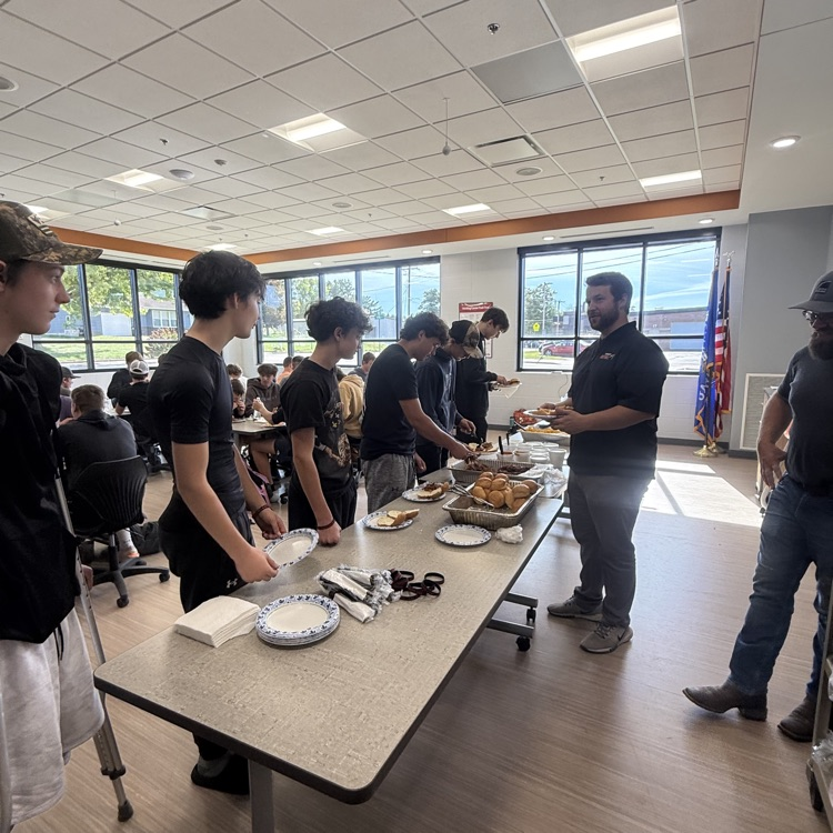football players getting lunch